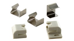 Mounting parts for ribbon cable ferrites